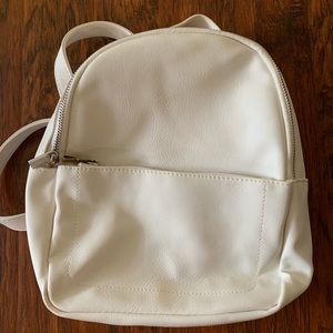 White mini backpack with pocket